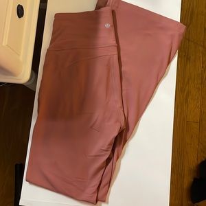 Lululemon flare pants, worn before, size 8. Super cute just too big.